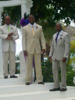 The groom, minister and best man waiting for Cynthia to enter.
