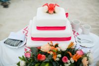 wedding cake made by The Royal, was an upgraded size that came with our wedding package. I was able to request the coral ribbon and coral roses for the top. The long floral arrangement on the table was a free surprise addition made by The Royal and put ou