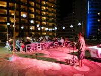 Ryan Rickman performing at our wedding Welcome Party at Beach Palace