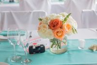 little centerpieces with a polaroid as a great detail to  capture moments of your guests
