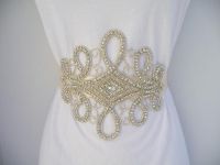 This Bridal Sash features hundreds of prong set genuine rhinestones designed in an elegant style.  Buy at www.BellaCescaBoutique.Etsy.com