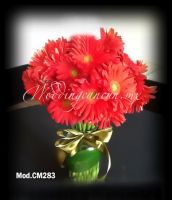 red gerbera daisies centerpiece