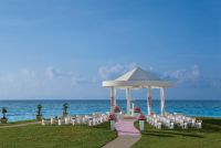 www.crystalwaterweddings.com Experienced travel agents who strongly value providing first class service and have a deep passion for destination weddings.  Dreams Cancun Resort & Spa. A stunning wedding set-up around the gazebo.   