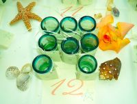 Shot glasses for each guest as a souvenir with names engraved by hand.